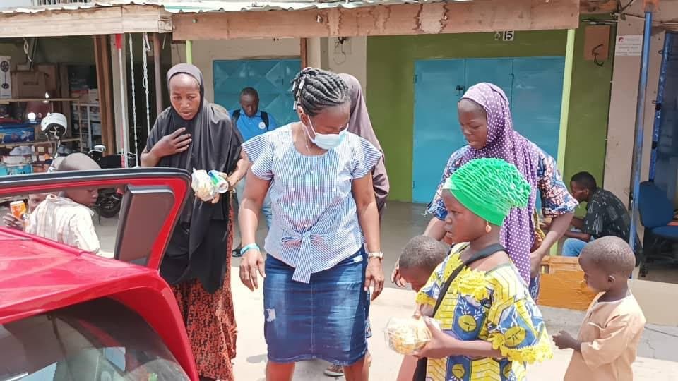 Foundation volunteers visiting families during an outreach